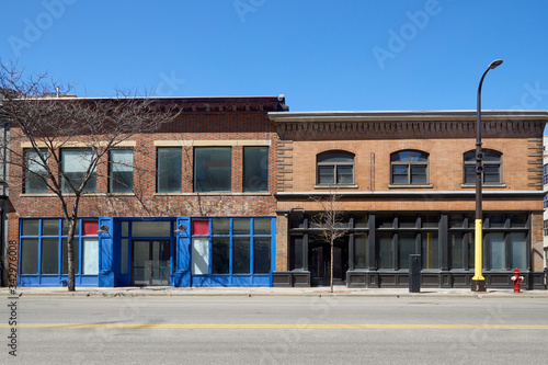 Empty storefronts on empty city street in northern city USA during Covid 19 photo