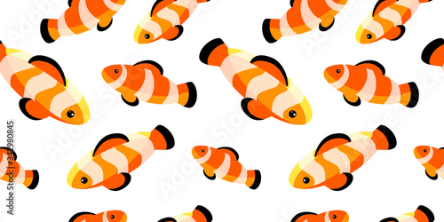 seamless pattern with bright clown fishes on white background