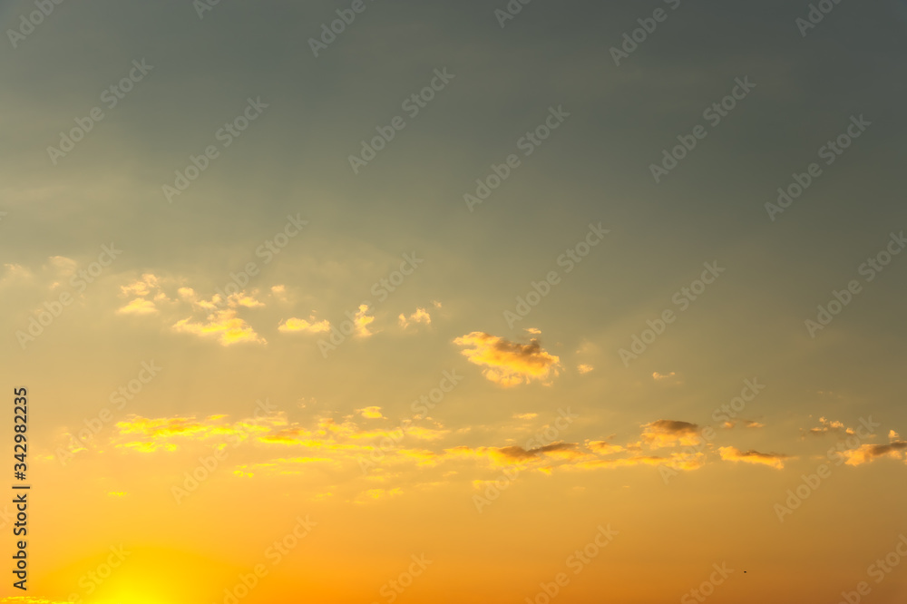 Sun and clouds with orange sky