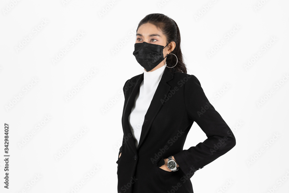 Portrait young Asian business woman in suit wearing face mask on white isolated background. Coronavirus flu virus , Covid 19 , Air pollution pm2.5 concept. Portrait young Asian business woman in suit wearing face mask on white isolated background. Coronavirus flu virus , Covid 19 , Air pollution pm2.5 concept.