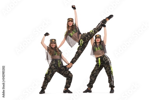 Showgirls in military costumes shot