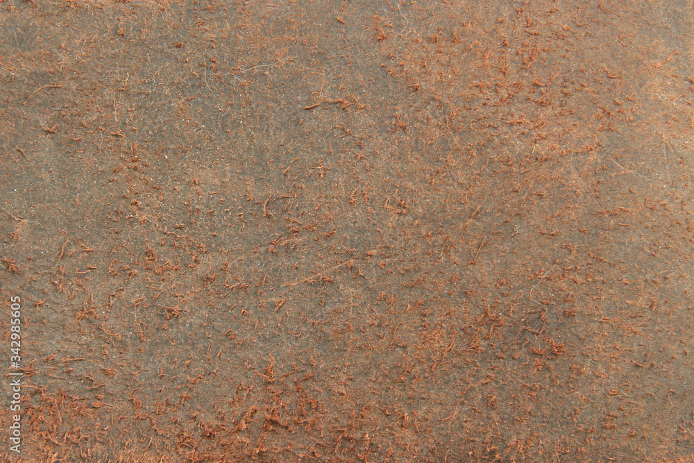 Brown genuine leather texture closeup. Background for text design. Brown genuine leather texture closeup. Background for text design.