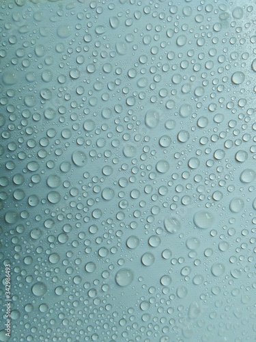 Water droplets on the glass background