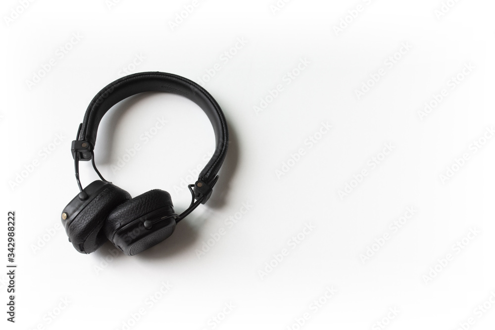Black headphone on white background. flat lay. Black headphone on white background. flat lay.