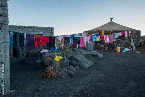 laundry colorful in blak lava © Christine