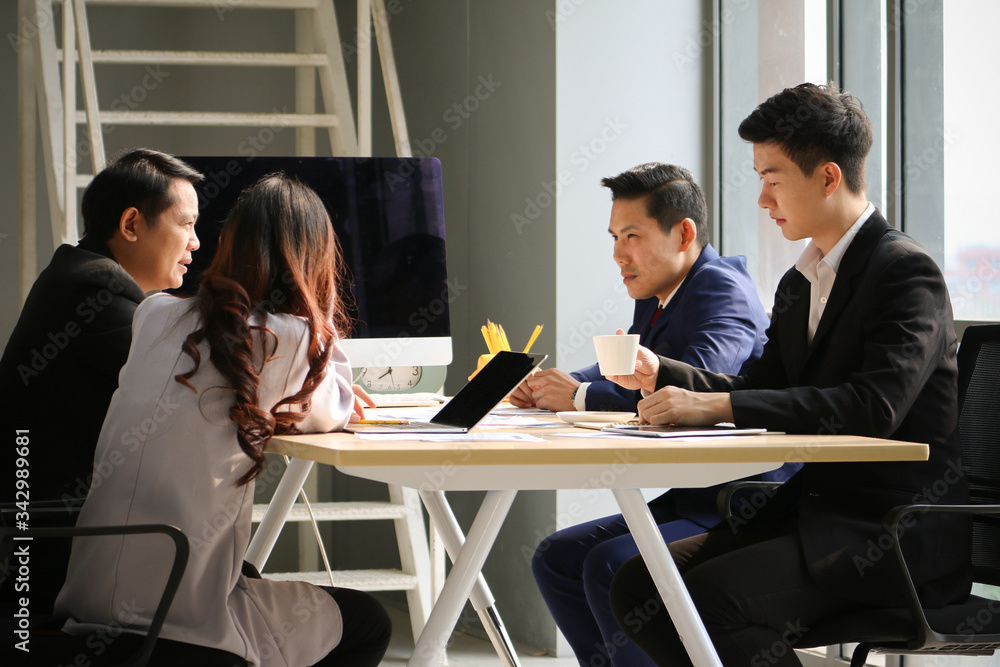 Group of business people team have meeting and talking and brainstorming in a conference room Group of business people team have meeting and talking and brainstorming in a conference room