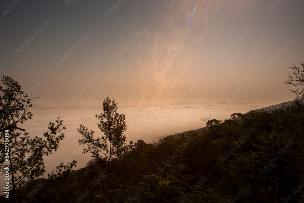 view over valley clouds in pastel