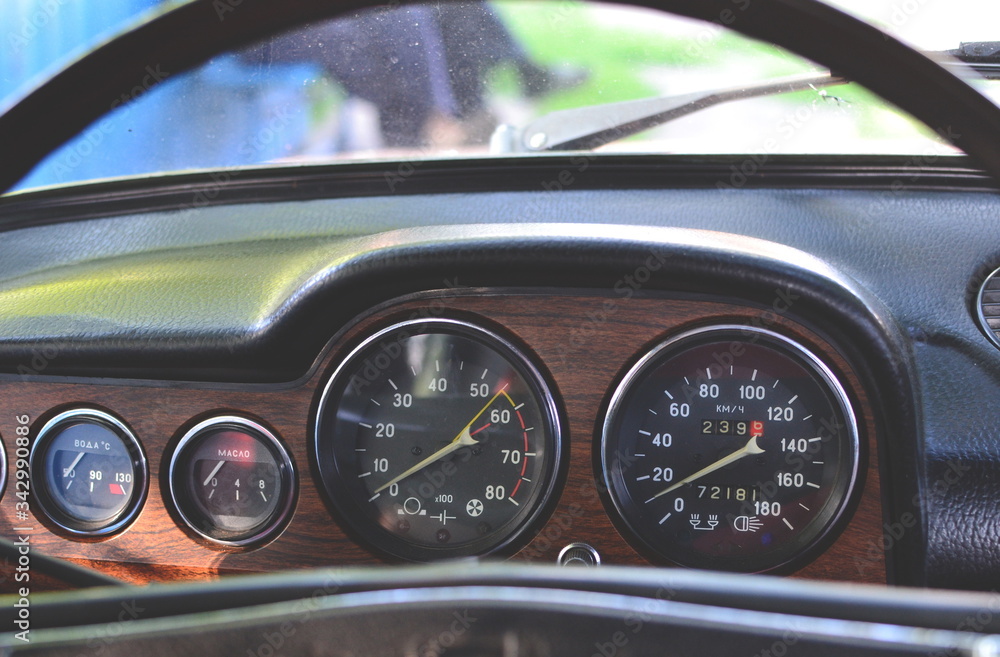 Closeup on a dashboard of a vintage car