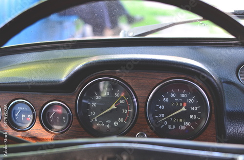 Closeup on a dashboard of a vintage car © carrera2904
