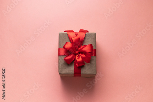 Wallpaper Mural White gift box with red ribbon, black background flat lay for stock image Torontodigital.ca