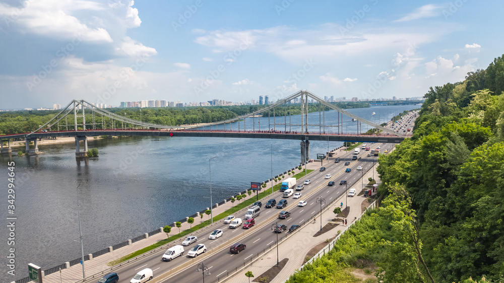 Aerial top view of Kiev city from above, Kyiv skyline, hills, pedestrian Park bridge and Dnieper river cityscape in spring, Ukraine
Aerial top view of Kiev city from above, Kyiv skyline, hills, pedestrian Park bridge and Dnieper river cityscape in spring, Ukraine