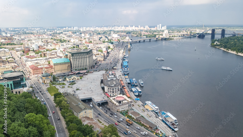 Aerial top view of Kyiv cityscape, Dnieper river and Podol historical district skyline from above, city of Kiev, Ukraine
