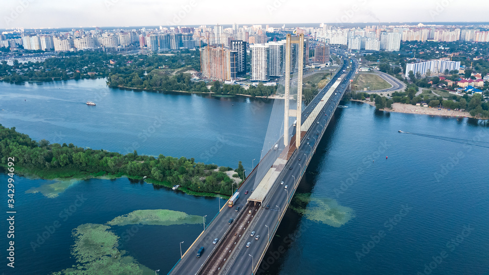 Fototapeta premium Aerial top view of South Bridge in Kiev city from above, Kyiv skyline and Dnieper river cityscape, Ukraine 