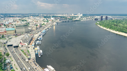 Aerial top view of Kyiv cityscape, Dnieper river and Podol historical district skyline from above, city of Kiev, Ukraine  © Iuliia Sokolovska
