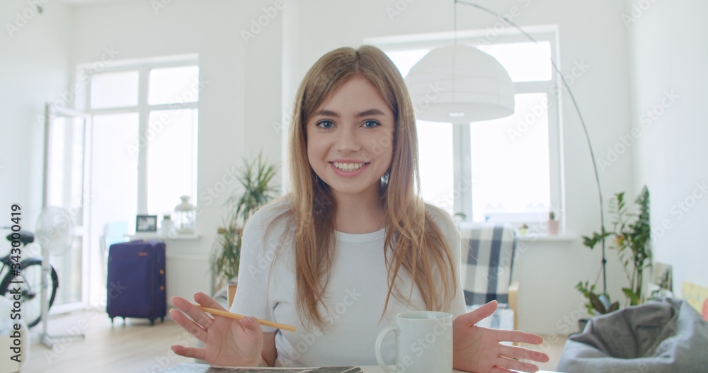 © Kaponia Aliaksei - Young woman makes video conference