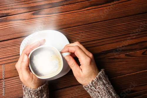 a female hands and coffee