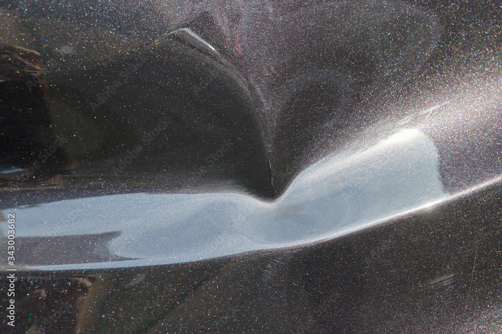 a black car body dent needs a repair a black car body dent needs a repair