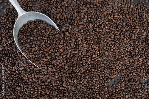 coffee bean on black wooden table background. top view