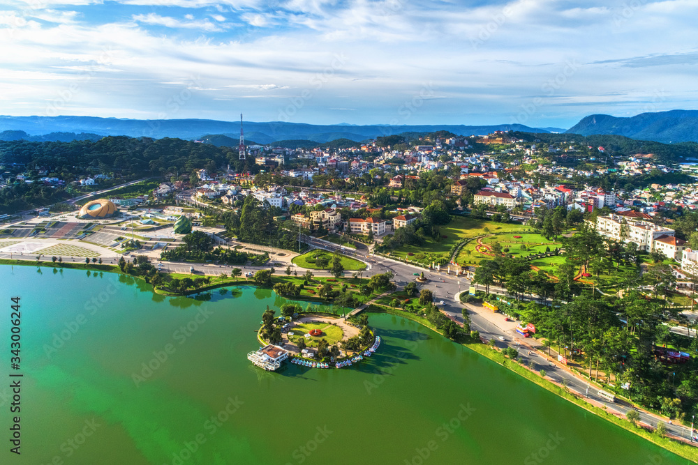 
Top view aerial photo from flying drone of a Da Lat City with development buildings, transportation. Tourist city in developed Vietnam.
