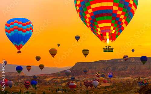 Hot air balloons landing mountain Tourists ride