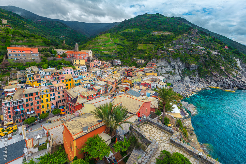 Vernazza with colorful houses and rocky coastline, Cinque Terre, Italy
