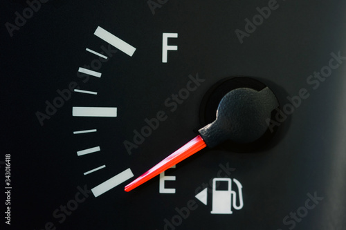 Car Fuel Gauge Showing Empty, close up