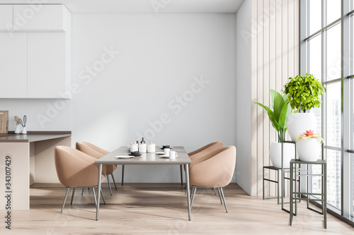 White and wooden dining room interior