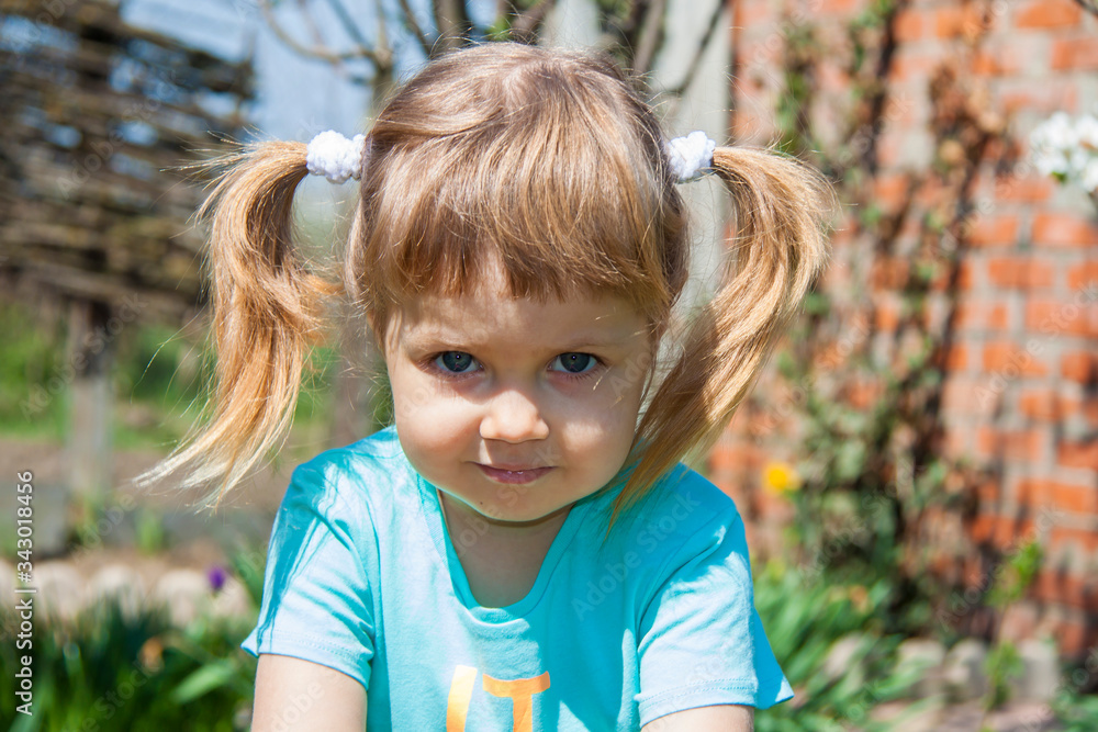 Portrait of a little girl baby with tails. Portrait of a little girl baby with tails.