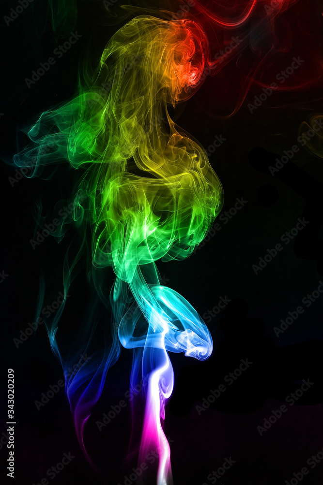 multicolored rainbow smoke on a black background multicolored rainbow smoke on a black background