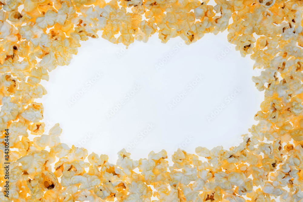 Heap of delicious popcorn, isolated on white background. Scattered salted popcorn, texture background. Top view, scattered salted popcorn texture background. Heap of delicious popcorn, isolated on white background. Scattered salted popcorn, texture background. Top view, scattered salted popcorn texture background.