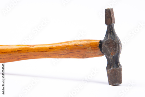 Wooden hammer isolated on white background.