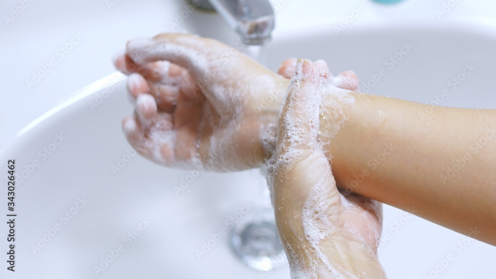 Concept of health cleaning and preventing from Coronavirus or COVID-19 pandemic prevention wash hands with soap and warm water rubbing fingers washing frequently or using hand sanitizer gel Concept of health cleaning and preventing from Coronavirus or COVID-19 pandemic prevention wash hands with soap and warm water rubbing fingers washing frequently or using hand sanitizer gel