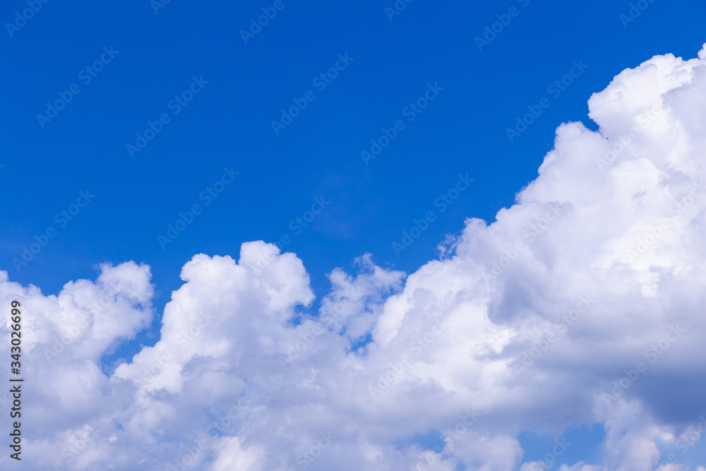 Blue sky background with white clouds on sunny day. Blue sky background with white clouds on sunny day.