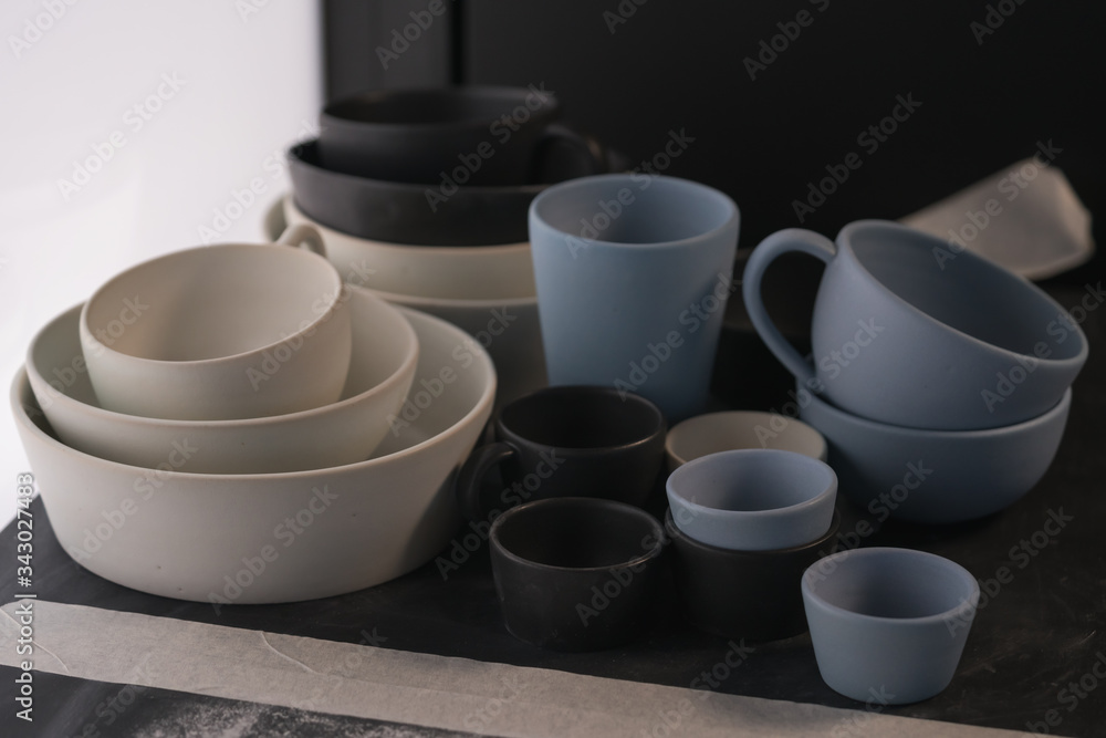 Matt ceramic handmade tableware in a workshop closeup Matt ceramic handmade tableware in a workshop closeup