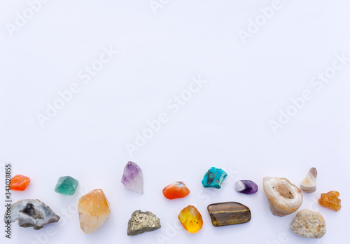 Invitation design template for face massage with chilled stones, lithotherapy, stone therapy. Beautiful gems, geodes, crystals, mineral stones isolated on white background.