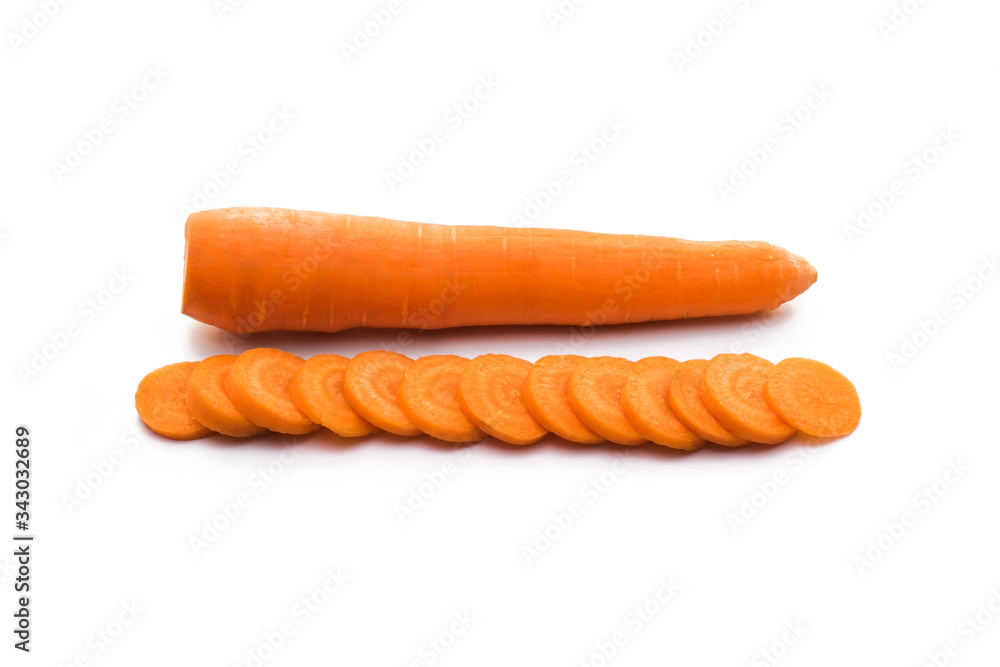 Carrots on a white background. Useful vitamins in vegetables. Food for vegetarians. Carrots on a white background. Useful vitamins in vegetables. Food for vegetarians.