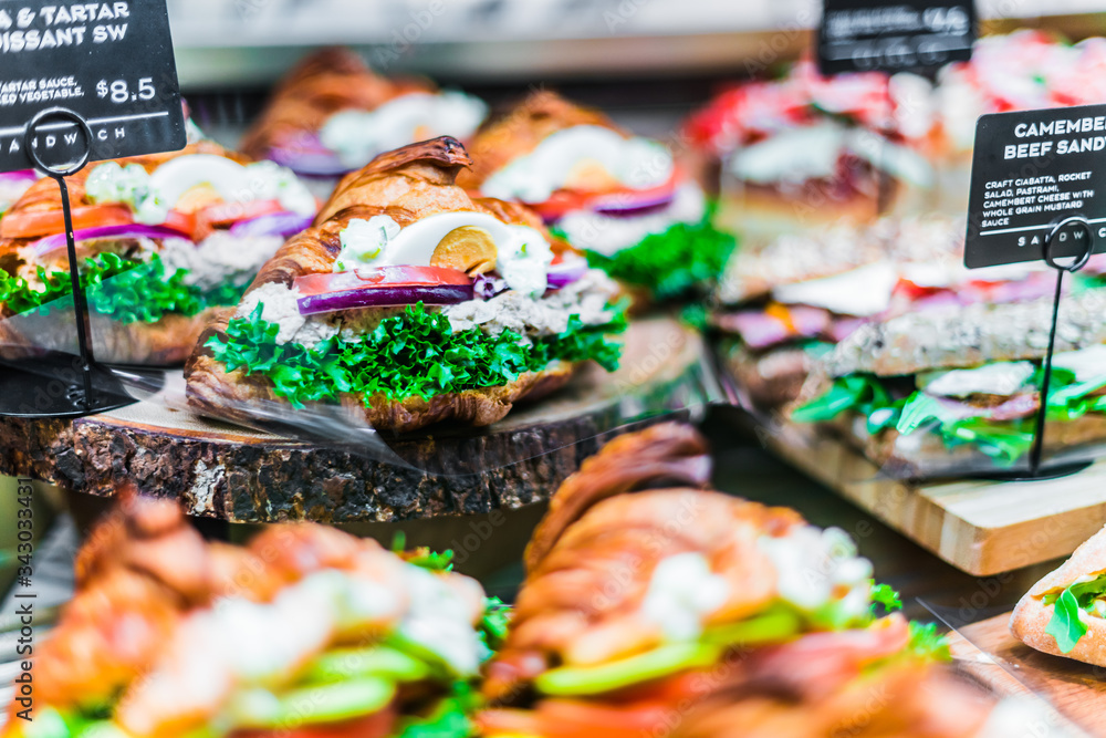 Fototapeta premium Freshly prepared sandwiches sold in fast food restaur