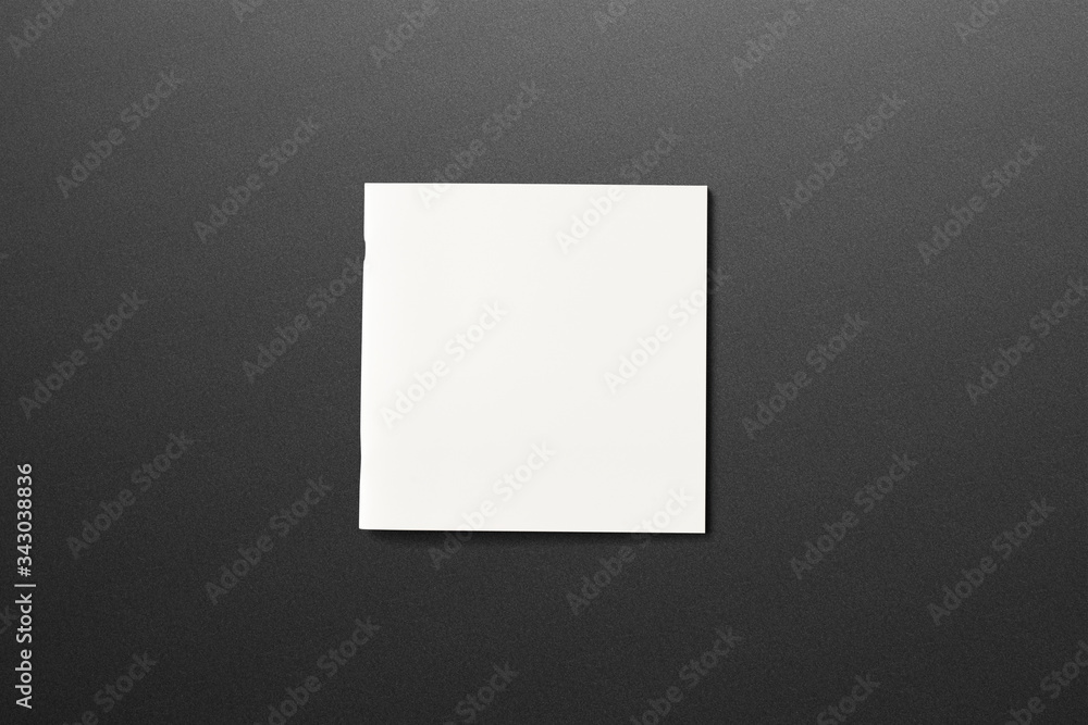 Square Magazine with blank soft cover on dark textured background. 3d illustration. Square Magazine with blank soft cover on dark textured background. 3d illustration.