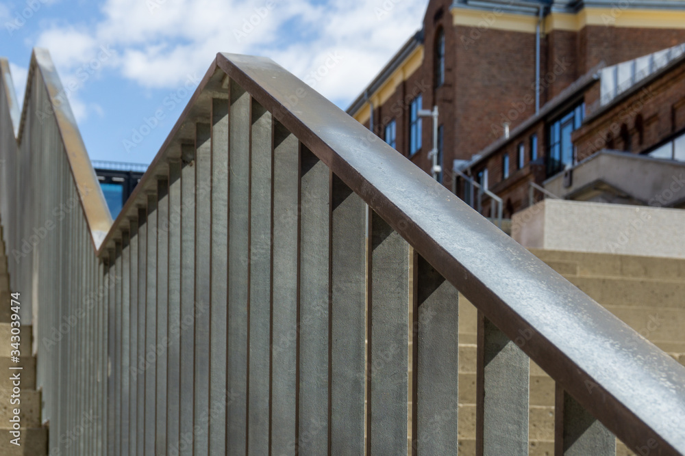 Close-up of modern outdoor handrail design. Close-up of modern outdoor handrail design.