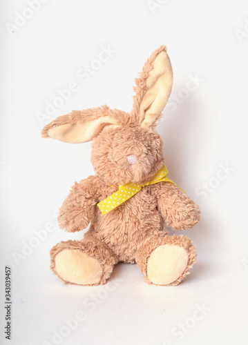 Rabbit plushie doll isolated on white background. Rabbit plush stuffed, Cute brown rabbit on white background.