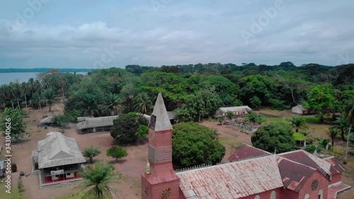 Small quiet african village in Gabon, drone shot of Sainte Anne's Mission at Fernand Vaz Lagoon photo