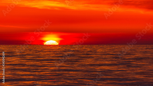 Bright colorful sunset over a calm sea