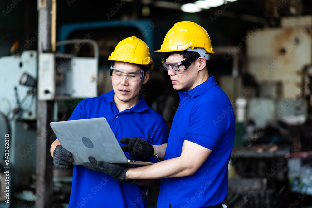 Professional Asian team engineering Man Worker at industrial factory ...
