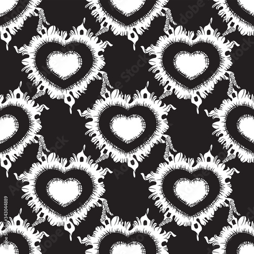 Seamless pattern of hearts on a black background. Vector image