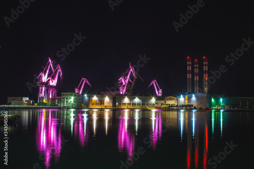 Lighting Giants - colorful illuminated cranes at night in Pula, Istrian Peninsula in Croatia