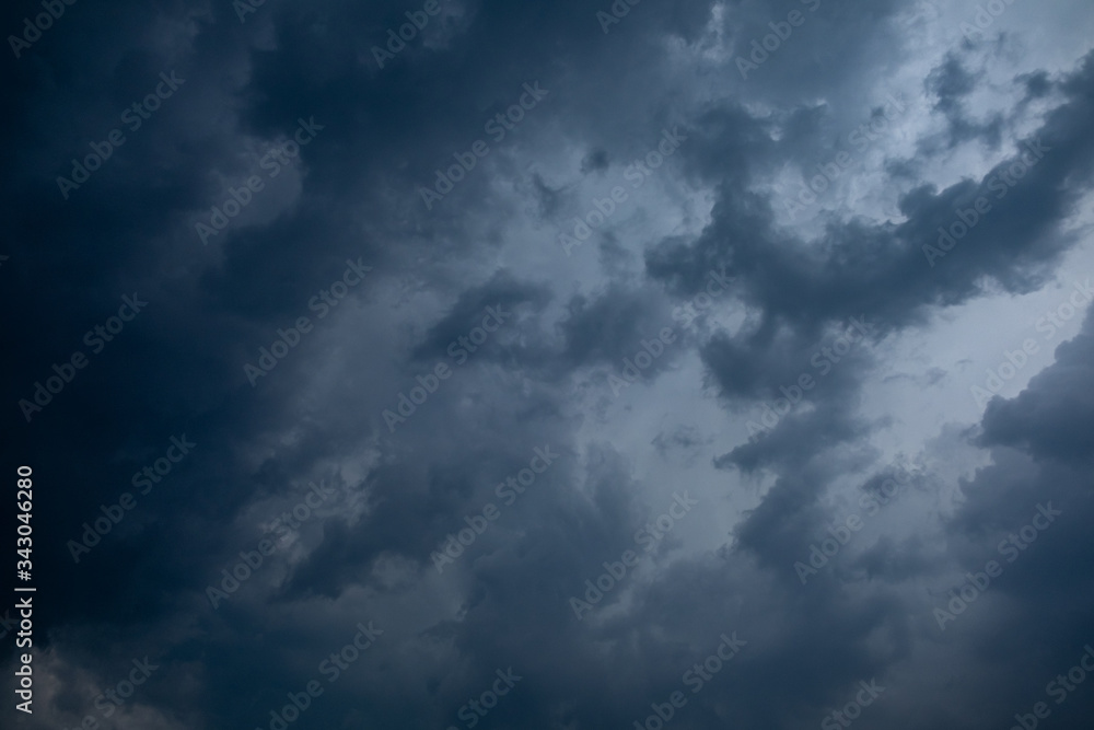 Light in the Dark and Dramatic Storm Clouds background,before the rain