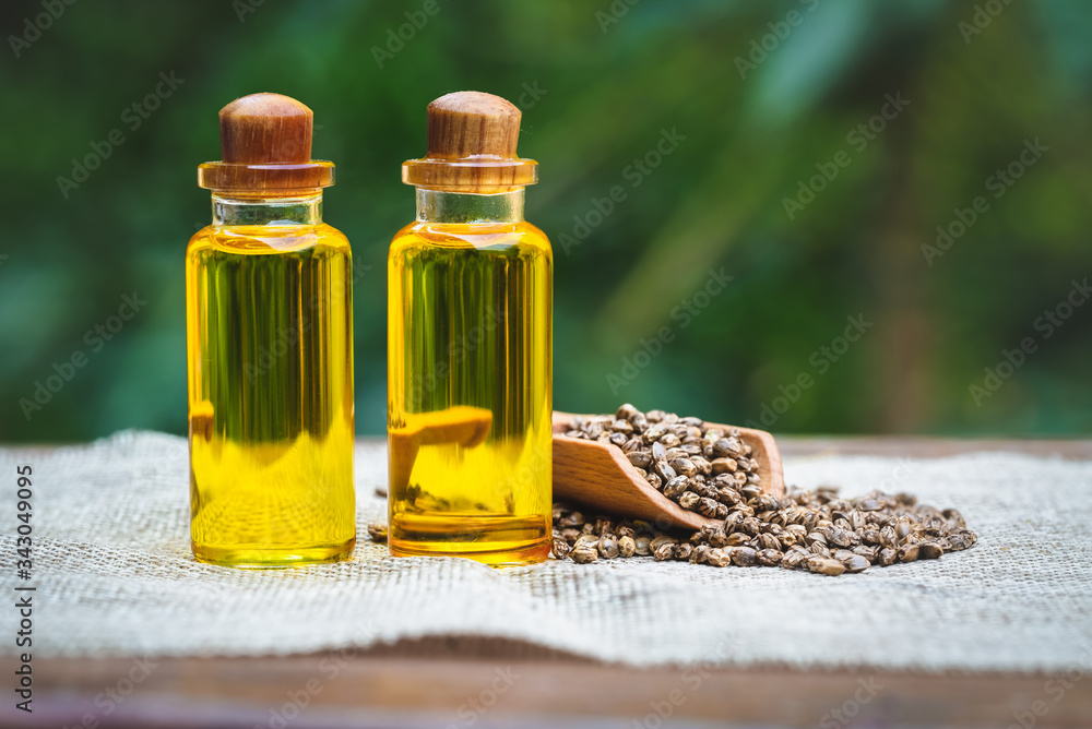 CBD oil hemp products, Medicinal cannabis with extract oil in a bottle. Medical cannabis concept CBD oil hemp products, Medicinal cannabis with extract oil in a bottle. Medical cannabis concept