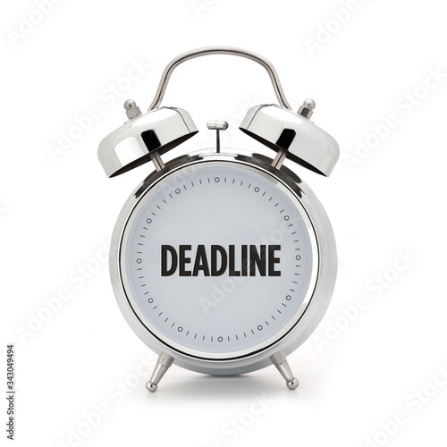 Deadline concept - alarm clock on white background