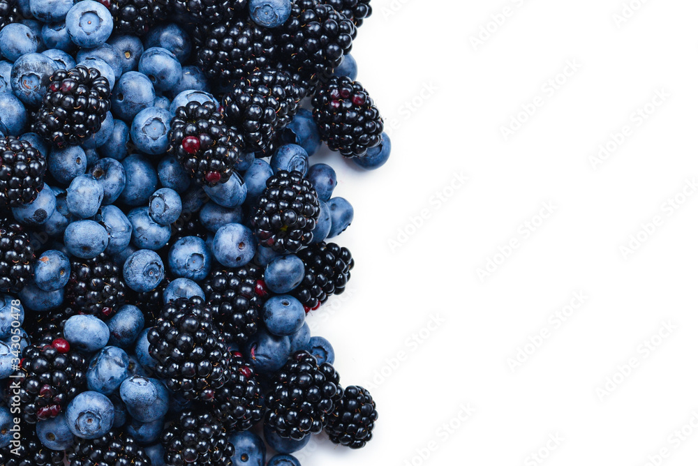 Blackberry and blueberry background. Top view. Blackberry and blueberry background. Top view.