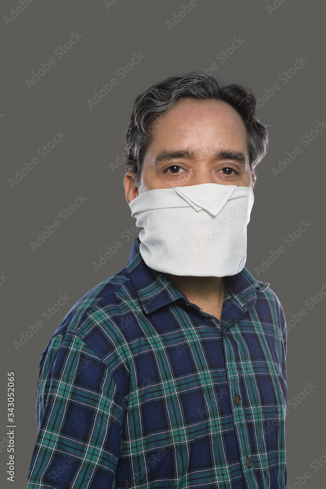Indian Man with Handkerchief Mask for Covid-19 / Coronavirus Prevention Indian Man with Handkerchief Mask for Covid-19 / Coronavirus Prevention